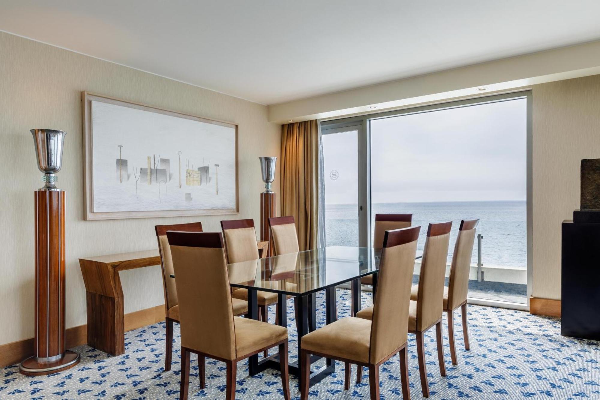 Sheraton Miramar Hotel & Convention Center Vina del Mar Esterno foto A dining room in a suite at the Hilton Tel Aviv